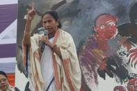 Chief minister of West Bengal state and Supremo of the Trinamool Congress (TMC) Political Party Mamata Banerjee (C) address during a rally demanding the withdrawal of the Citizenship Amendment Act and National Register of Citizens (NRC) in Kolkata, India, Friday, Dec. 20, 2019. (Photo by Debajyoti Chakraborty/NurPhoto via Getty Images)