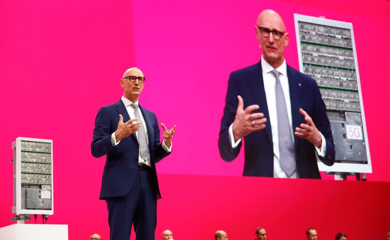 Tim Hoettges, CEO of Deutsche Telekom AG stands in front of an Ericsson 5 G antenna during the company's AGM in Bonn