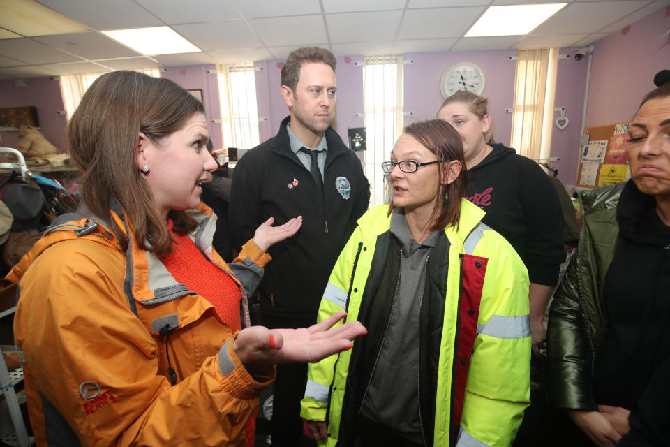 Liberal Democrats leader Jo Swinson speaks to volunteer Rosie Squires in the Stainforth 4 All charity shop during a visit to Stainforth in South Yorkshire to meet people affected by flooding.