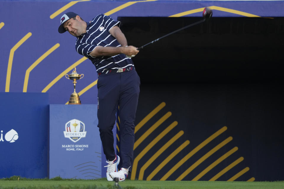 United States' Scottie Scheffler plays his shot from the 1st tee during his morning Foursome match at the Ryder Cup golf tournament at the Marco Simone Golf Club in Guidonia Montecelio, Italy, Friday, Sept. 29, 2023. (AP Photo/Andrew Medichini)