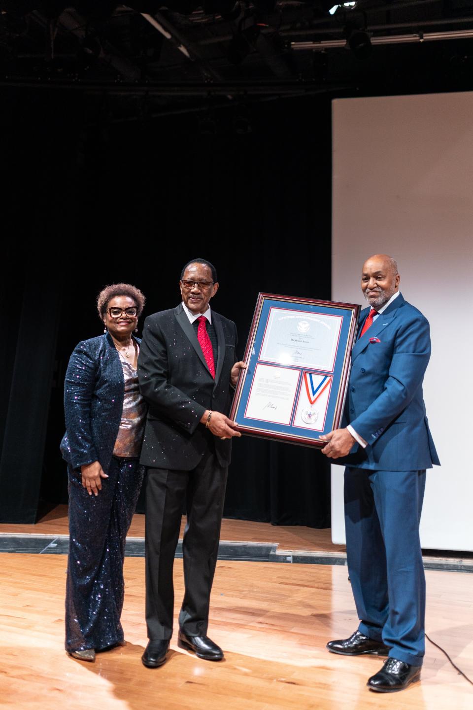 Dr. Bobby Jones receives the Americorps Points of Light Presidential Lifetime Achievement Award at the National Museum of African-American Music.