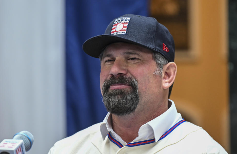 Newly elected Baseball Hall of Fame inductees Todd Helton talks with reporters during a news conference Thursday, Jan. 25, 2024, in Cooperstown, N.Y. (AP Photo/Hans Pennink)
