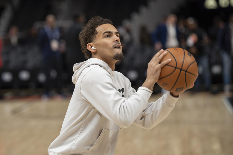 Atlanta Hawks guard Trae Young warms up before an NBA basketball game against the Golden State Warriors, Friday, March 17, 2023, in Atlanta. (AP Photo/Hakim Wright Sr.)