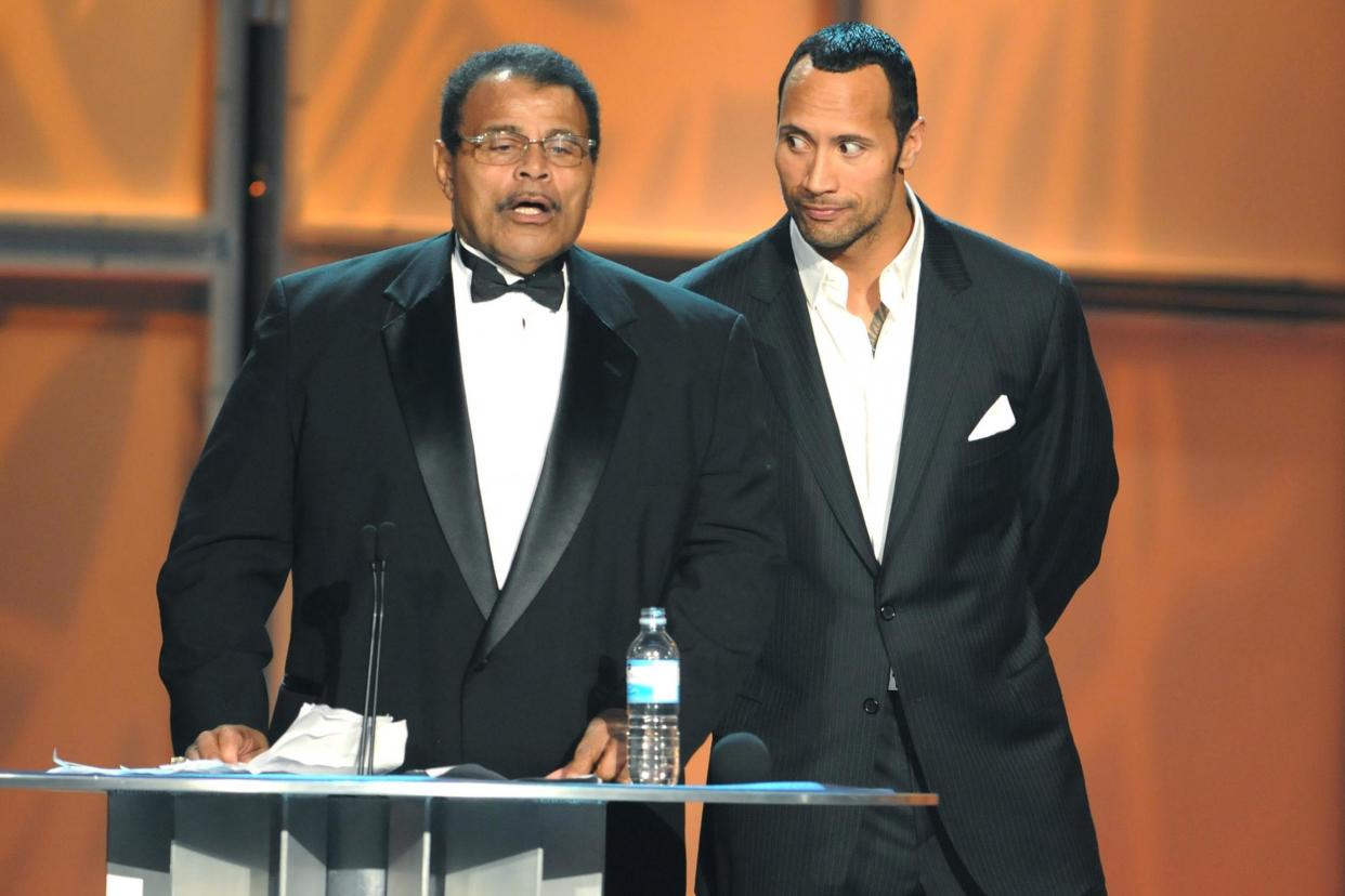 Rocky Johnson, left, pictured with his son Dwayne 'The Rock' Johnson: MediaPunch/REX/Shutterstock