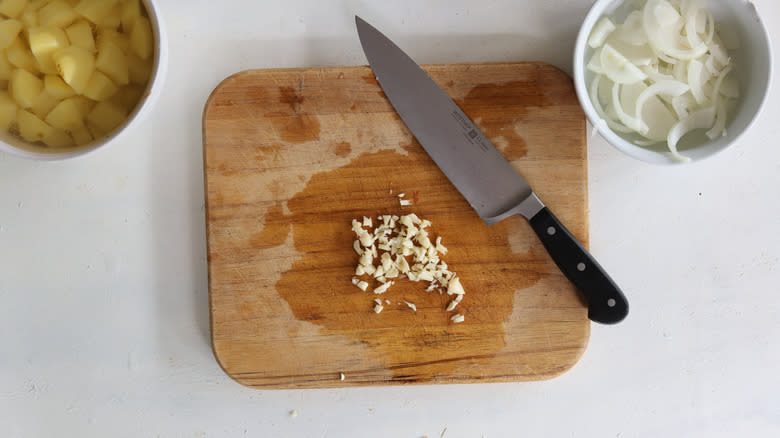 minced garlic on cutting board