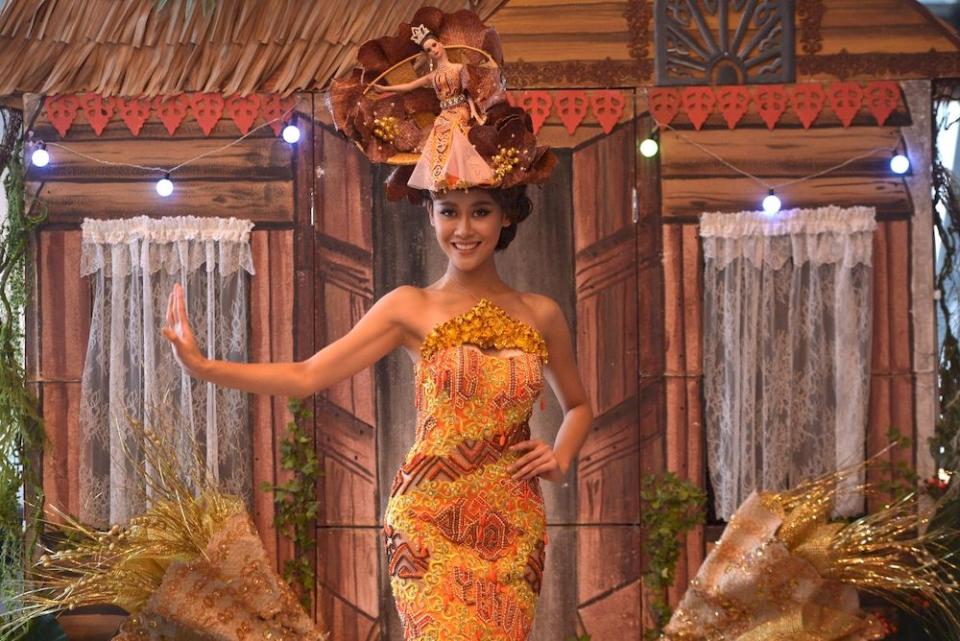 The national costume which boasts an element of surprise weighs 45kg and took three months to complete.