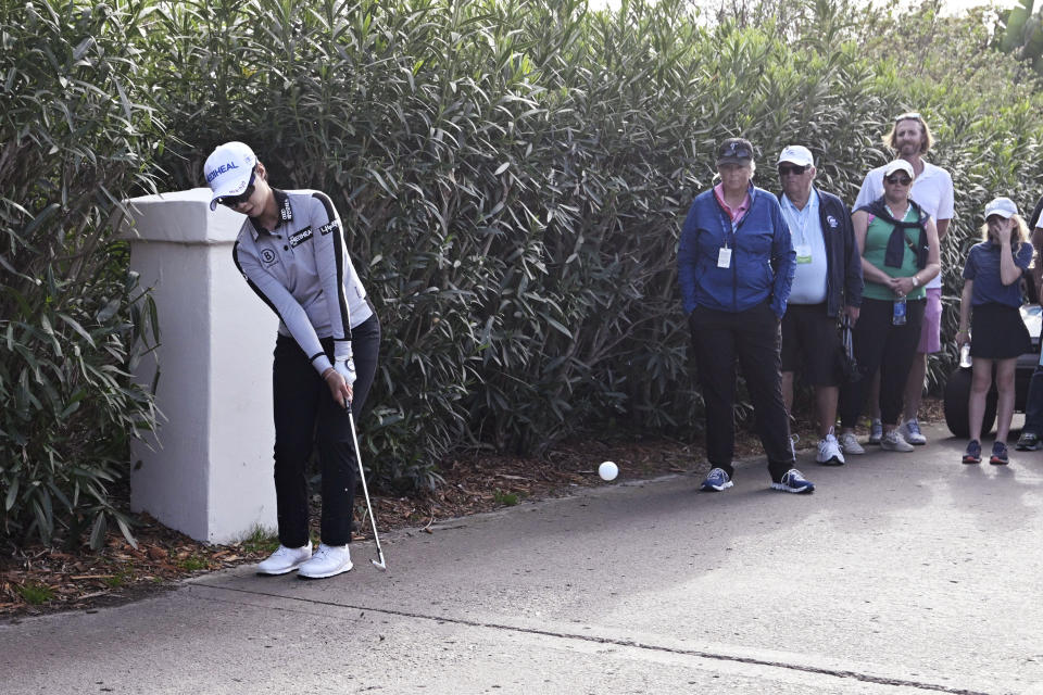 Na Rin An, of South Korea, hits off the cart path on the 18th hole during the third round of the JTBC Classic LPGA golf tournament, Saturday, March 26, 2022, in Carlsbad, Calif. (AP Photo/Denis Poroy)