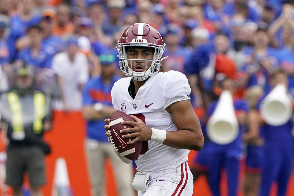 Alabama quarterback Bryce Young looks for a receiver during the first half of an NCAA college football game against Florida, Saturday, Sept. 18, 2021, in Gainesville, Fla. (AP Photo/John Raoux)