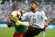 Soccer Football - Germany v Cameroon - FIFA Confederations Cup Russia 2017 - Group B - Fisht Stadium, Sochi, Russia - June 25, 2017 Cameroon’s Collins Fai in action with Germany’s Kerem Demirbay REUTERS/Kai Pfaffenbach