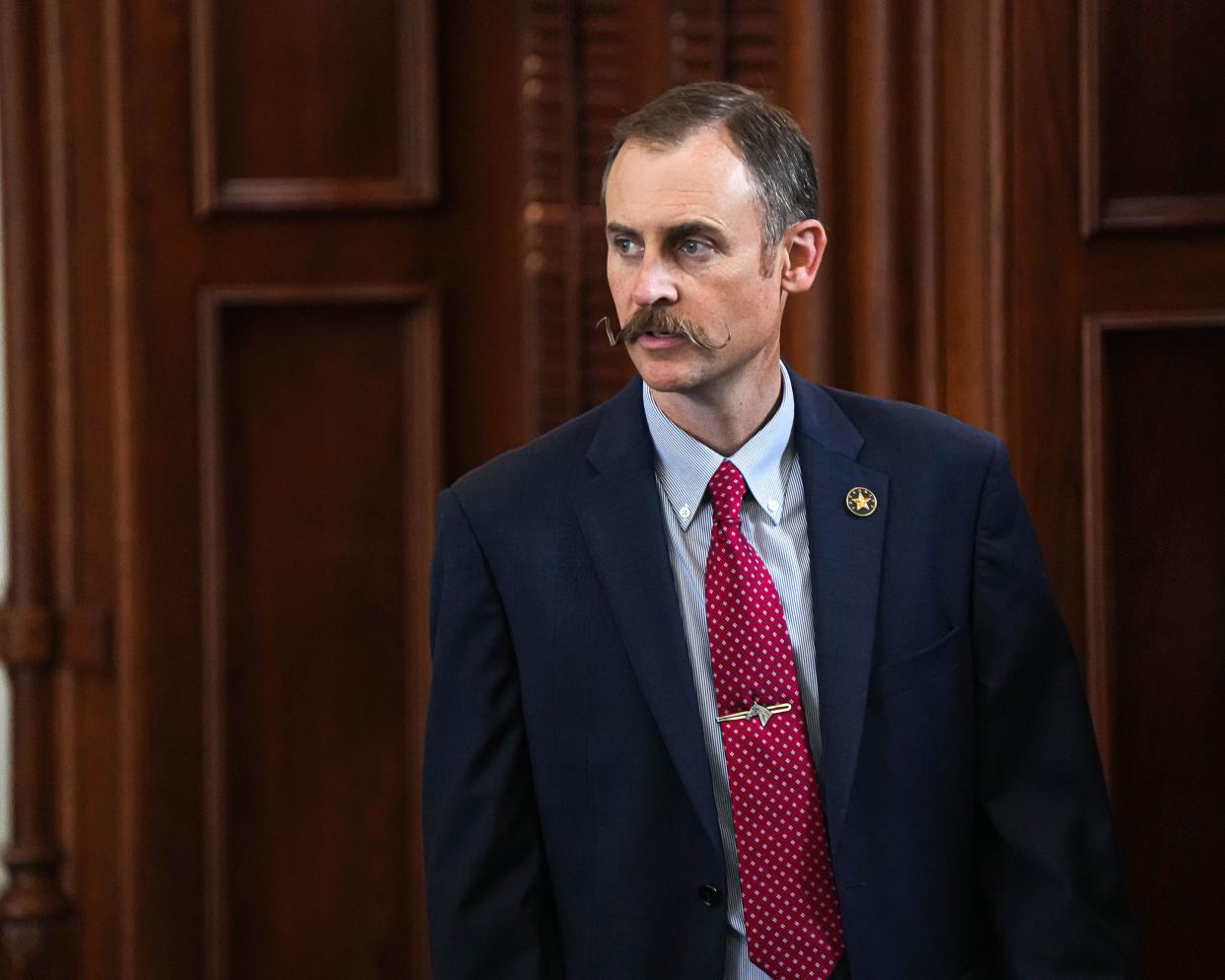 House Impeachment Manager Rep. Andrew Murr takes enters the Senate chamber for final votes in the impeachment trial of Attorney General Ken Paxton at the Texas Capitol on Saturday, Sep. 16, 2023.
