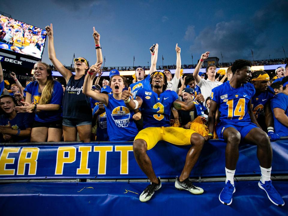 Damar Hamlin celebrates with Pittsburgh fans.