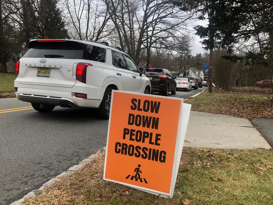 A sign posted by Montclair residents on Upper Mountain Ave. near a crosswalk where two pedestrians were hit in the past two months.