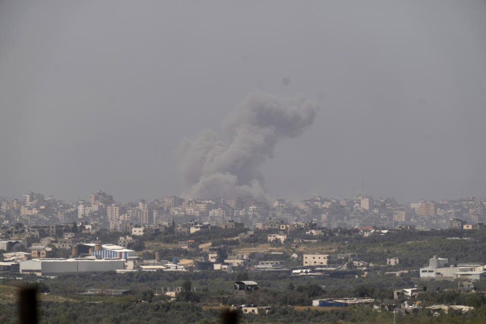 Smoke rises following an explosion in the Gaza Strip as seen from southern Israel, Wednesday, March 27, 2024. (AP Photo/Ohad Zwigenberg)