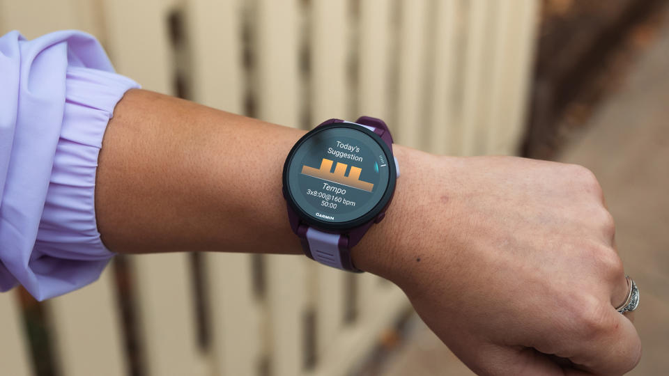 The Garmin Forerunner 165 on a wrist