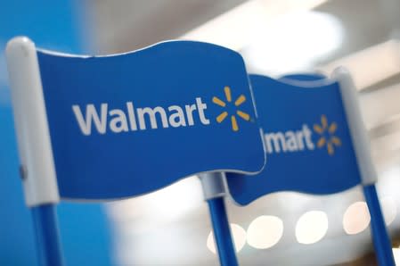 FILE PHOTO: Walmart signs are displayed inside a Walmart store in Mexico City