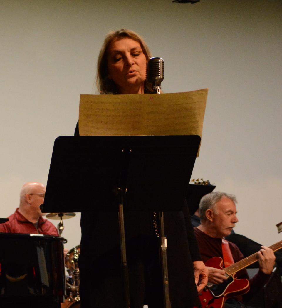 Joyce Lancaster, TCA Big Band VocalAire, puts the finishing touches on Cole Porter's "Night and Day" during a rehearsal for the TCA Big Band and VocalAires' concert on May 15.