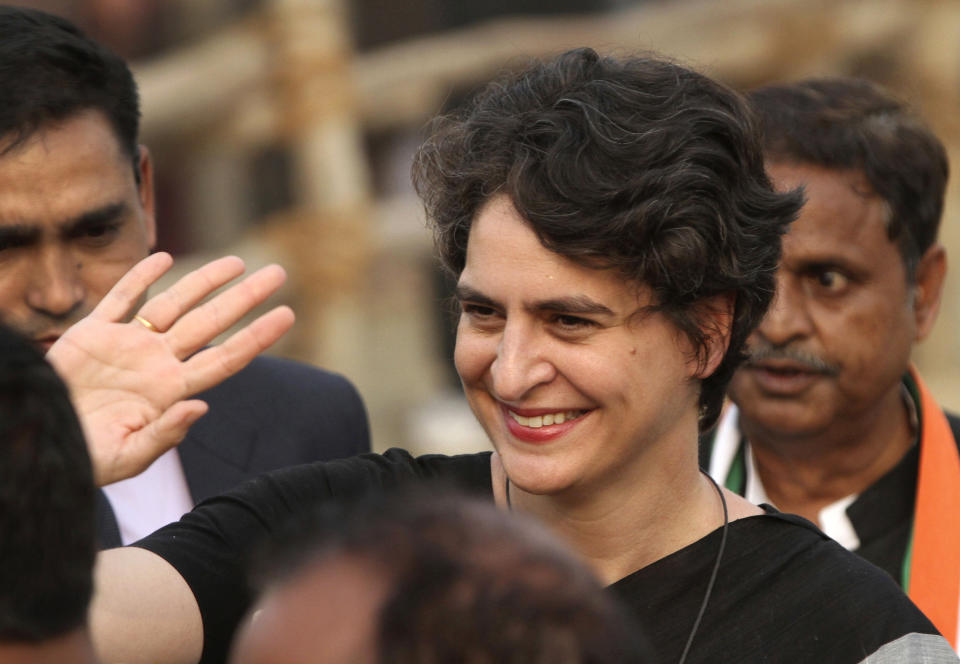 FILE- In this Thursday, Feb. 16, 2017, file photo, Priyanka Gandhi Vadra, sister of Congress party President Rahul Gandhi, waves to party supporters during an election campaign rally in Rae Barelli in the northern Indian state of Uttar Pradesh, India. Priyanka Gandhi Vadra, the scion of India's most famous political dynasty, has formally entered party politics with opposition Congress party assigning her a position as it prepares for the national elections due before May. (AP Photo/Rajesh Kumar Singh, file)