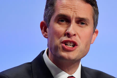 FILE PHOTO: Britain's Defence Secretary Gavin Williamson addresses the Conservative Party Conference in Birmingham, Britain September 30, 2018. REUTERS/Toby Melville/File Photo