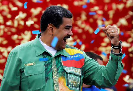 Venezuela's President Nicolas Maduro greets supporters during his closing campaign rally in Caracas, Venezuela May 17, 2018. REUTERS/Carlos Jasso