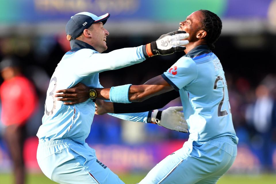 Jos Buttler (L) and England's Jofra Archer celebrate as England win the Cricket World Cup (AFP/Getty Images)