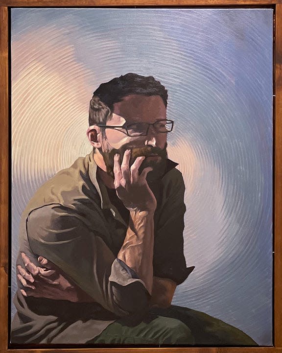 Kyle Gorenschek won second prize for his oil painting 'The Price of Solitude' in Rahr-West Art Museum's juried exhibition 'Being: A Recognition of Self and Other.'