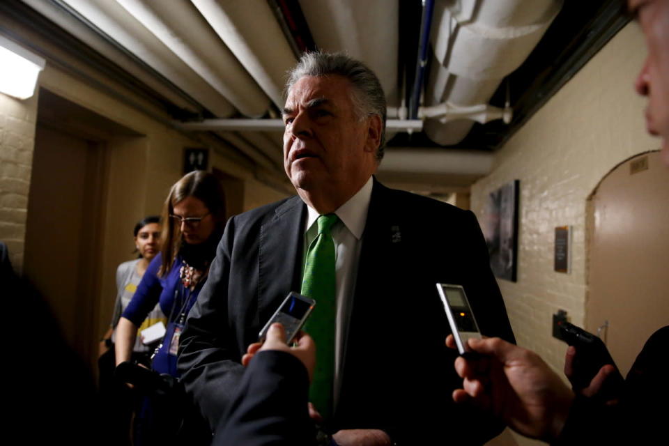 Peter King talks with reporters 