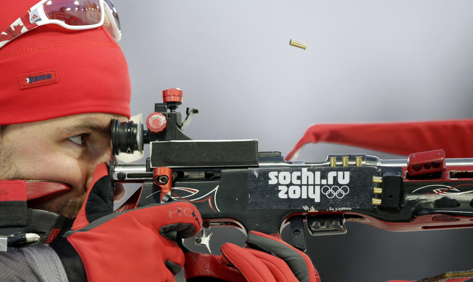 Canada's Jean-Philippe le Guellec shoots during the men's biathlon 4x7.5K relay at the 2014 Winter Olympics, Saturday, Feb. 22, 2014, in Krasnaya Polyana, Russia. (AP Photo/Lee Jin-man)