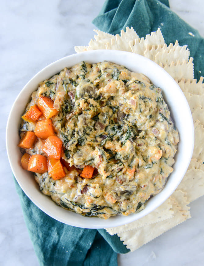 <strong>Get the <a href="http://www.howsweeteats.com/2015/11/roasted-butternut-squash-spinach-dip/">Roasted Butternut Squash And Spinach Dip recipe </a>from How Sweet It Is</strong>