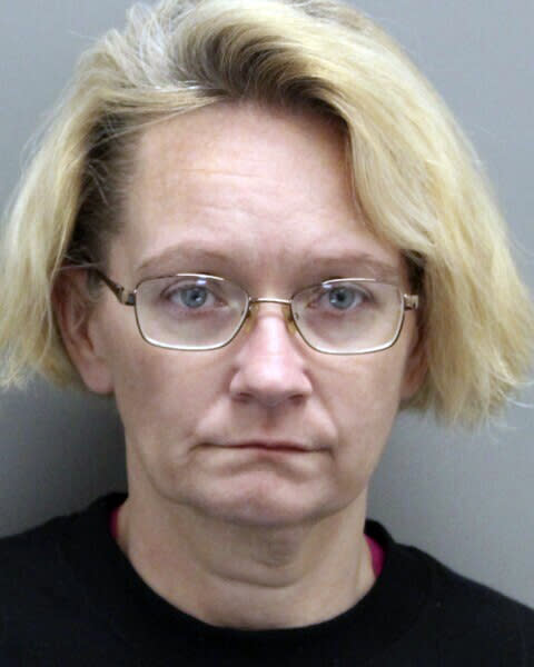 This photo provided by the Delaware Department of Justice shows Mary Vinson, 46, who was sentenced Thursday, Feb. 29, 2024 to 106 years in prison for abusing and torturing her two stepsons over a period of almost two years. Vinson pleaded guilty last year to 30 felony counts. The judge who sentenced her described the abuse inflicted on the children as "the most extensive and persistent evil" he has ever seen. (Delaware Dept. of Justice via AP)