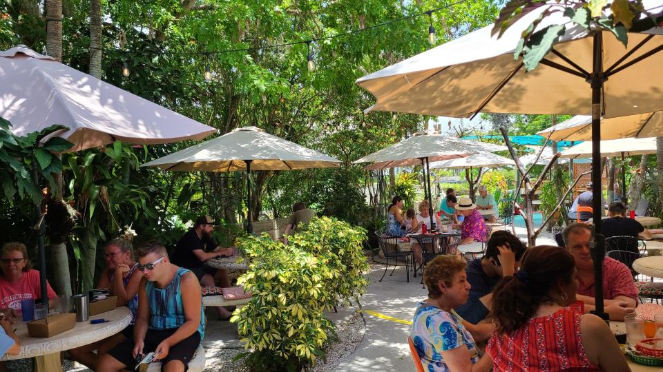 Umbrellas, bay breezes and plentiful greenery keep Havanna Cafe's lush patio blissfully cool even in the summer.