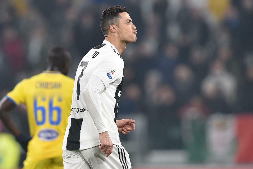 Juventus' Cristiano Ronaldo celebrates after scoring during the Serie A soccer match between Juventus and Frosinone at the Allianz Stadium in Turin, Italy, Friday, Feb. 15, 2019. (Alessandro Di Marco/ANSA via AP)