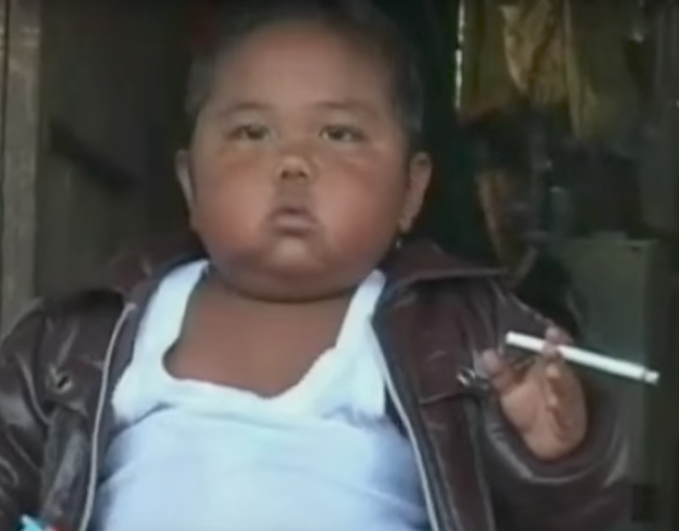 <em>Chain-smoker – Aldi’s addiction at the age of two made headlines around the world (Pictures: YouTube/ITN)</em>