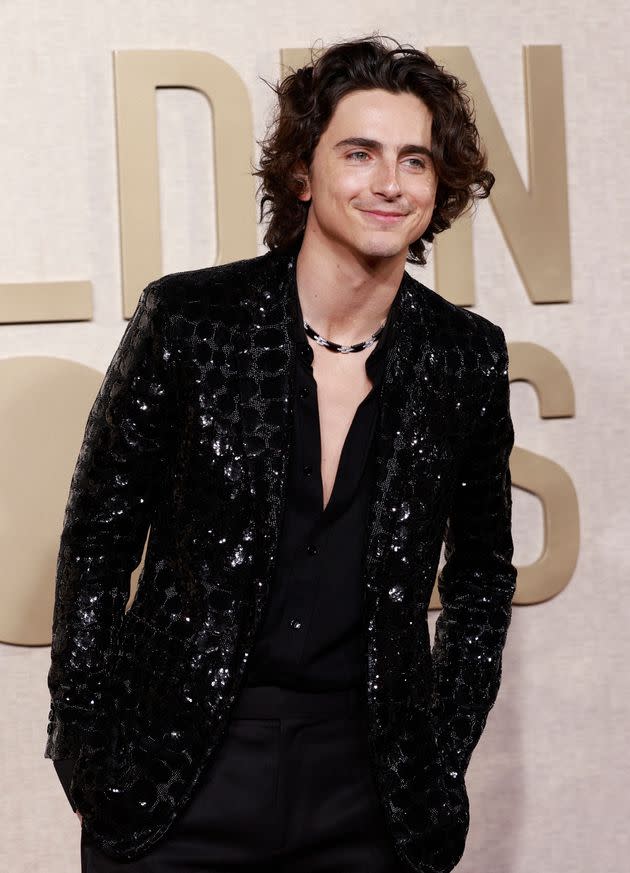 Timothee Chalamet rocked an all-black suit with black sequin details.