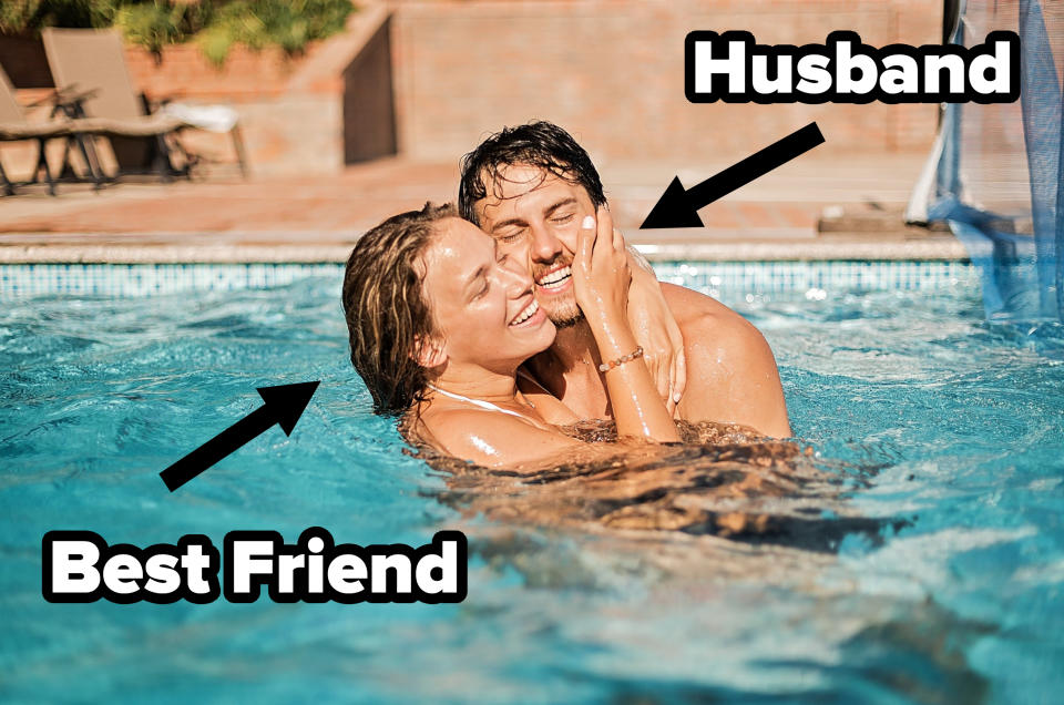 A couple embraces and laughs joyfully while standing in a pool