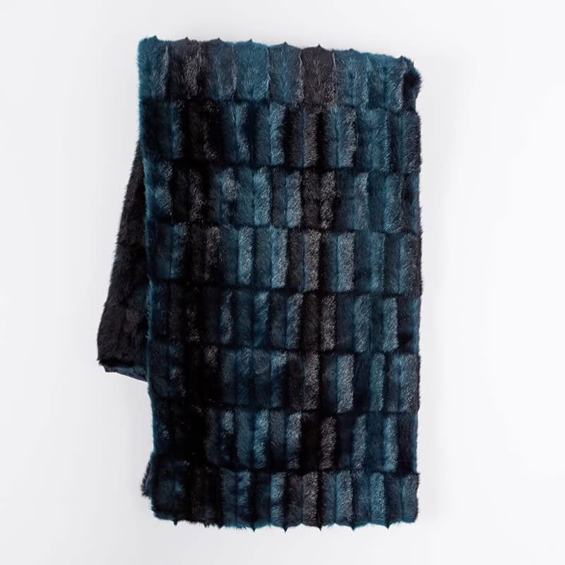 <p>Unwind in exquisite comfort with these West Elm faux fur throws. </p><p>Buy it <a rel="nofollow noopener" href="http://www.westelm.com/products/faux-fur-check-throw-t3308/?pkey=cthrows-blankets" target="_blank" data-ylk="slk:here;elm:context_link;itc:0;sec:content-canvas" class="link ">here</a> for $50 (originally $89).</p>