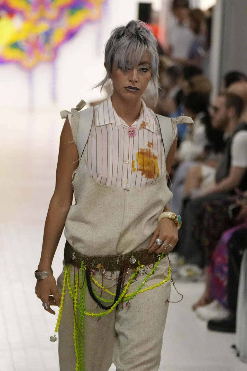 A model wears a creation as part of the Simon Cracker men's and women's Spring Summer 2024 collection presented in Milan, Italy, Sunday, June 18, 2023. (AP Photo/Luca Bruno)