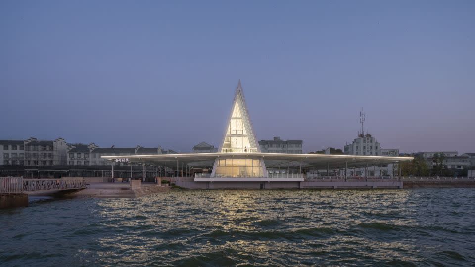 Chinese firm UAO Design’s tent-like Liangzi Island Off-island Pier tent-features a glass-fronted visitor center overlooking a lake in the city of Ezhou. - 2024 World Architecture Festival