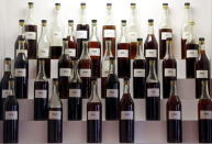 Bottles and rare samples of Cognac are displayed in a tasting room at the Remy Martin headquarters in Cognac, southwestern France, November 6, 2015. REUTERS/Regis Duvignau