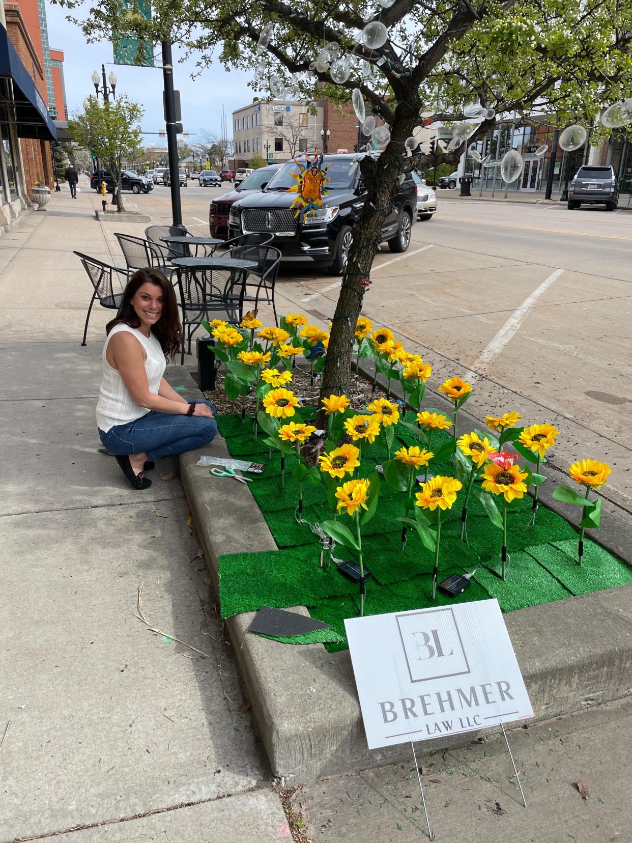 “Spring Fling” features tree beds on Wisconsin Avenue from The Plaza to the library on both sides of the street filled with art and other items. Decorations will be on display through June 9.