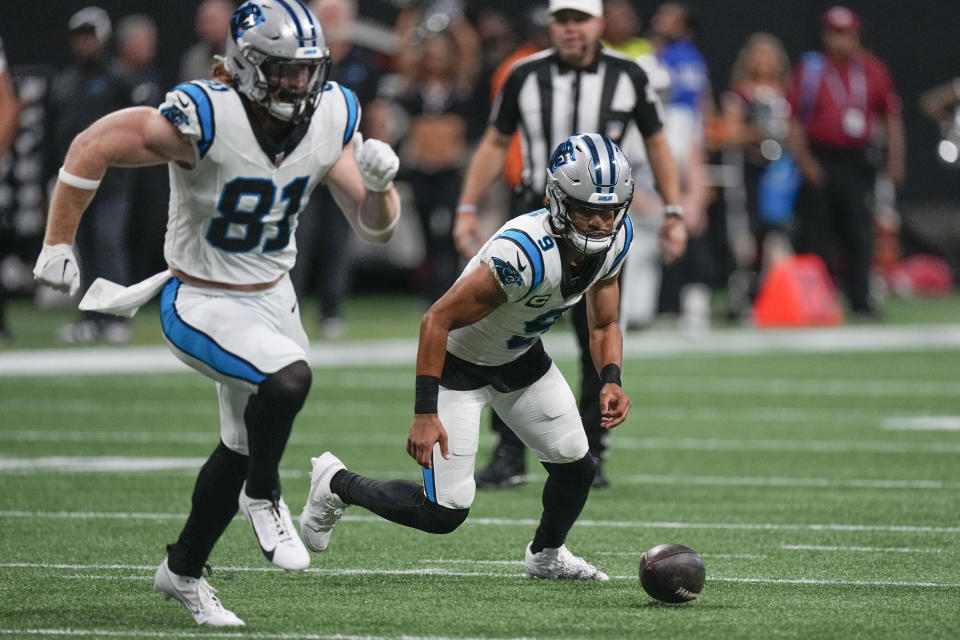 Carolina Panthers quarterback Bryce Young (9) recovers his own fumble against the Atlanta Falcons during the first half of an NFL football game, Sunday, Sept. 10, 2023, in Atlanta. (AP Photo/John Bazemore)