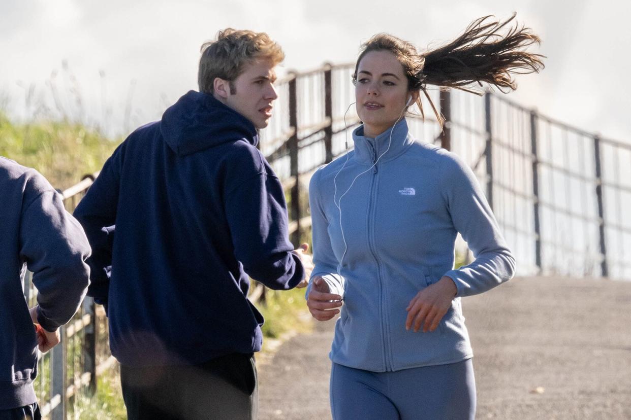 EXCLUSIVE: Prince William actor Ed McVey and Meg Bellamy's Kate Middleton film a scene for Netflix' series The Crown near St Andrews, Scotland
