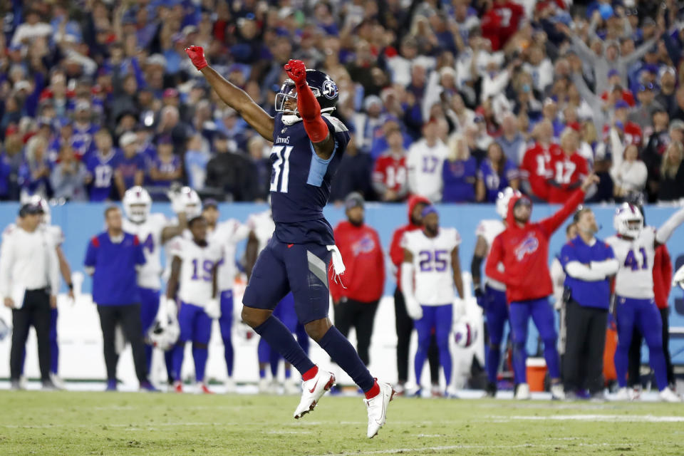 Tennessee Titans free safety Kevin Byard (31) celebrates after the Titans stopped the Buffalo Bills from gaining a first down and ending their final drive of the game in the fourth quarter of an NFL football game Monday, Oct. 18, 2021, in Nashville, Tenn. The Titans won 34-31. (AP Photo/Wade Payne)