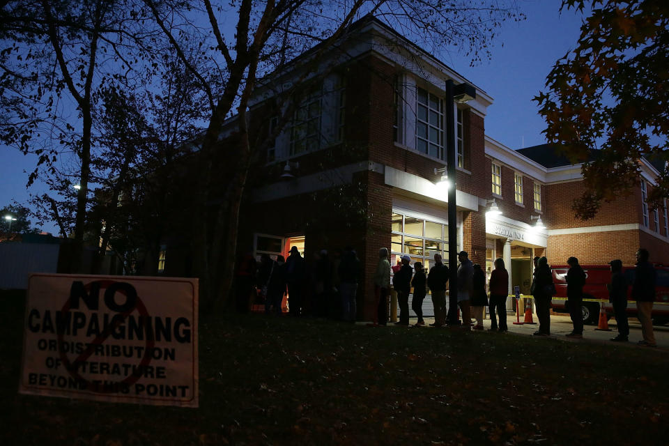 Voters wait in-line for casting their ballots outside a polling place on Election Day in Alexandria, Virginia, Tuesday, on Nov. 8.