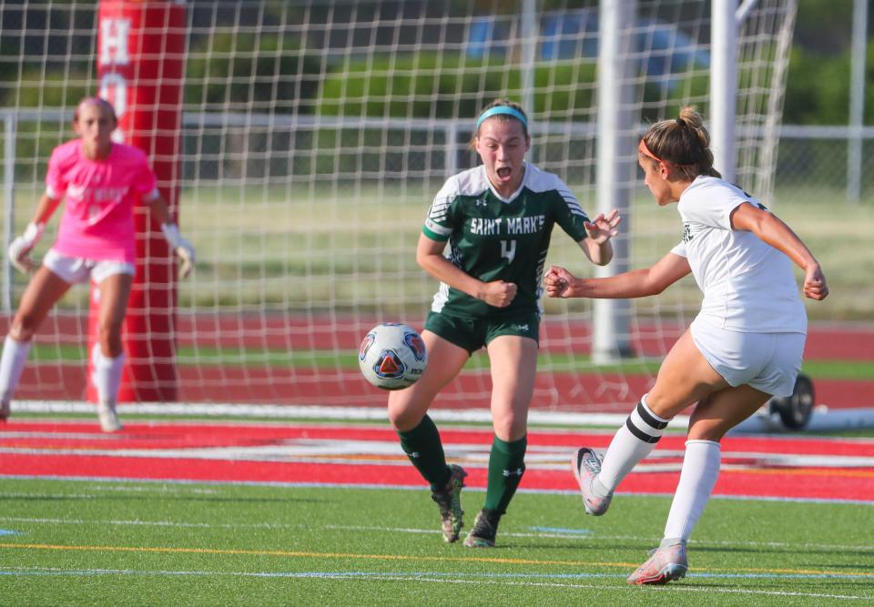 Archmere's Emma Gioffre (right) blasts a shot past St. Mark's Kaileigh	Brady for the first goal of the game as Archmere builds a 6-1 halftime lead before winning the DIAA Division II championship game by the same score at Delaware State University's Alumni Stadium, Friday, June 2, 2023.
