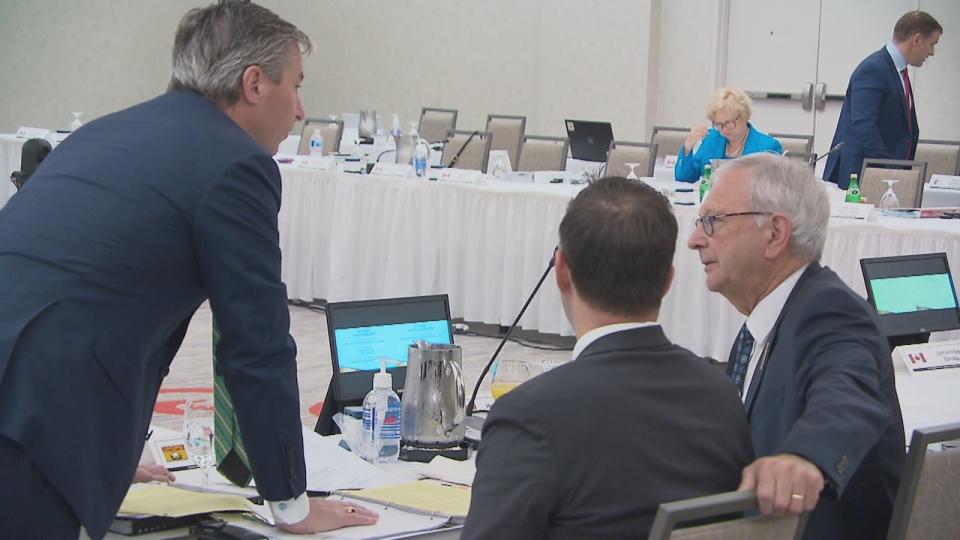 New Brunswick Premier Blaine Higgs and Nova Scotia Premier Tim Houston, pictured at the Atlantic Growth Strategy Meeting in Moncton on Tuesday, say they’re not accepting that Ottawa will only pay for half of the project to shore up the Chignecto Isthmus.