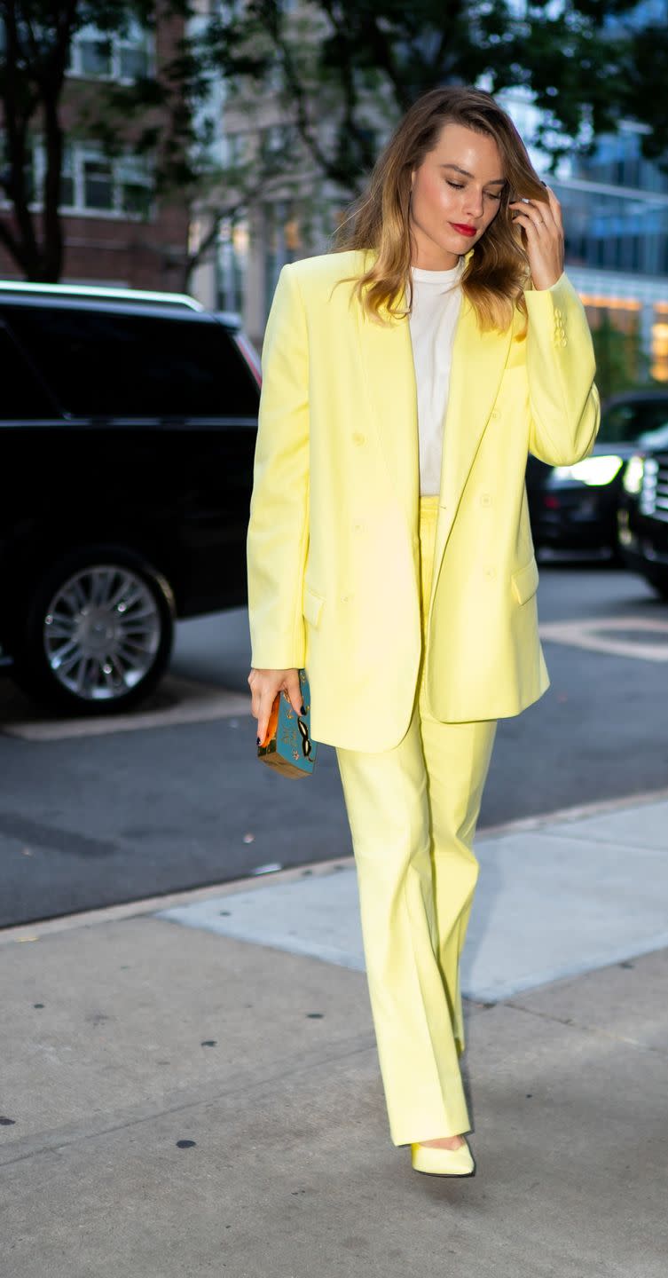 <p>The actress rocked an Eighties-inspired neon yellow power suit from The Attico and a white T-shirt during a day out in New York City.<br></p>