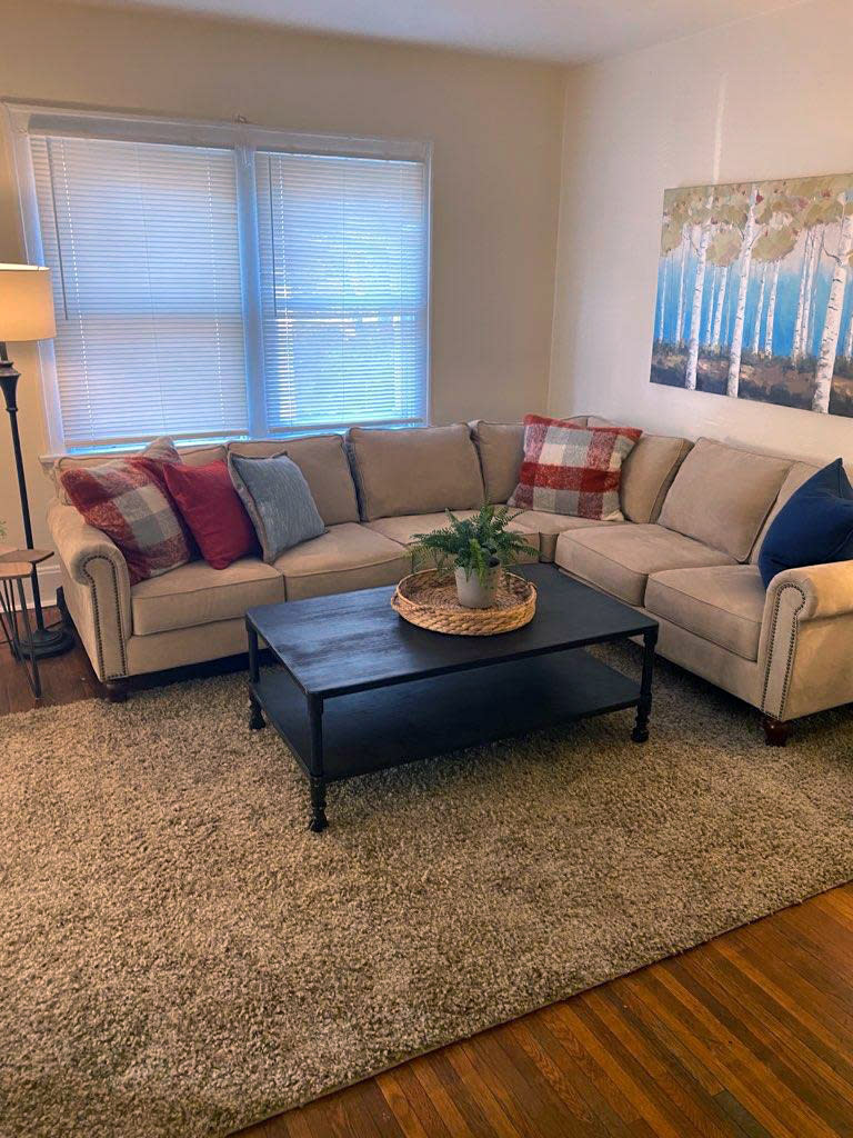 The apartment was fully furnished by Design to Market, a real estate staging company that donated almost all the furniture and accessories. (Courtesy Suzanne Burke)