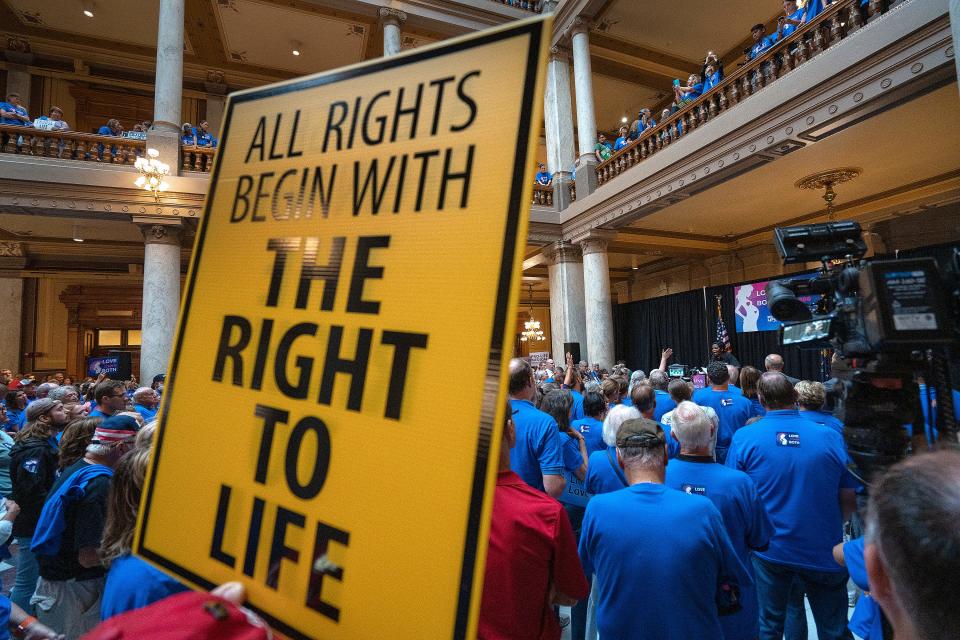 People gather during the Love them Both Rally hosted by Right to Life Indiana at the Indiana Statehouse, Tuesday, July 26, 2022 in Indianapolis, Ind.  Indiana legislature are in a special session to discuss abortion law.
