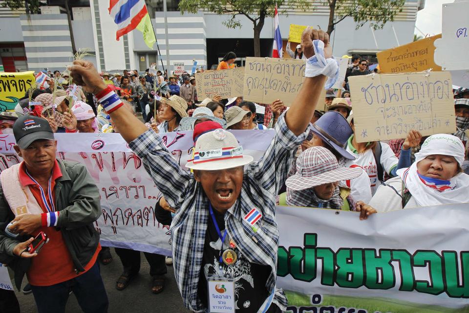 Farmers protest outside the temporary office of Thai Prime Minister Yingluck in Bangkok