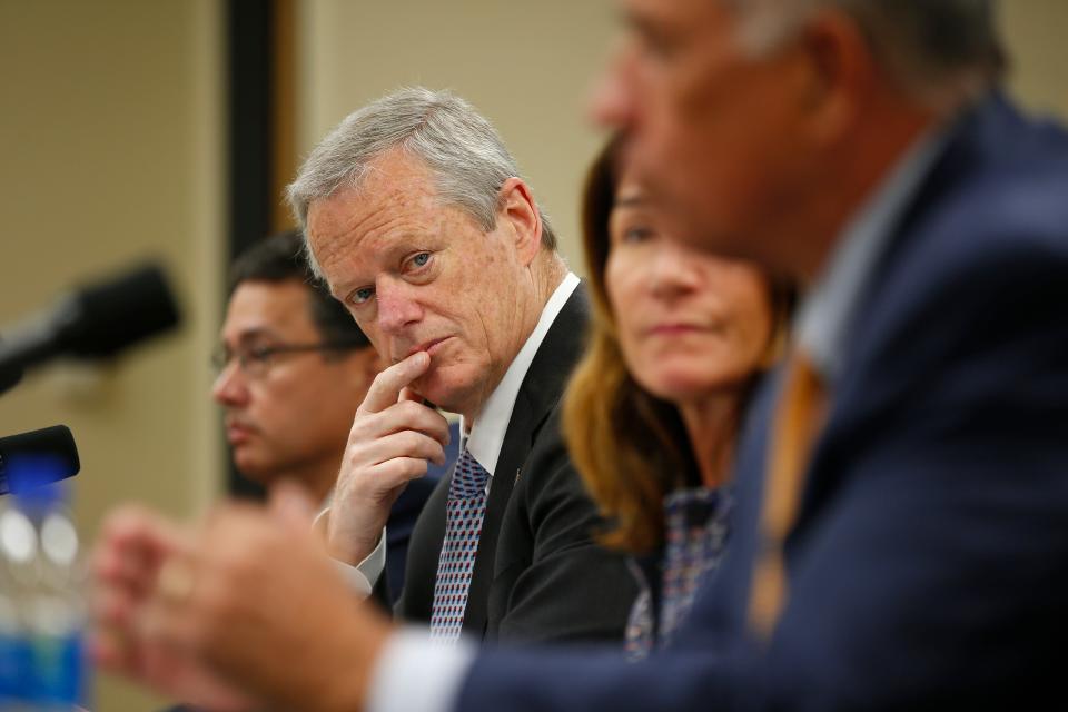 Massachusetts Governor Charlie Baker and Lt Governor Karyn Polito listen to Bristol County DA Thomas M. Quinn III speak during a Dangerousness Roundtable discussion held at UMass Law in Dartmouth.